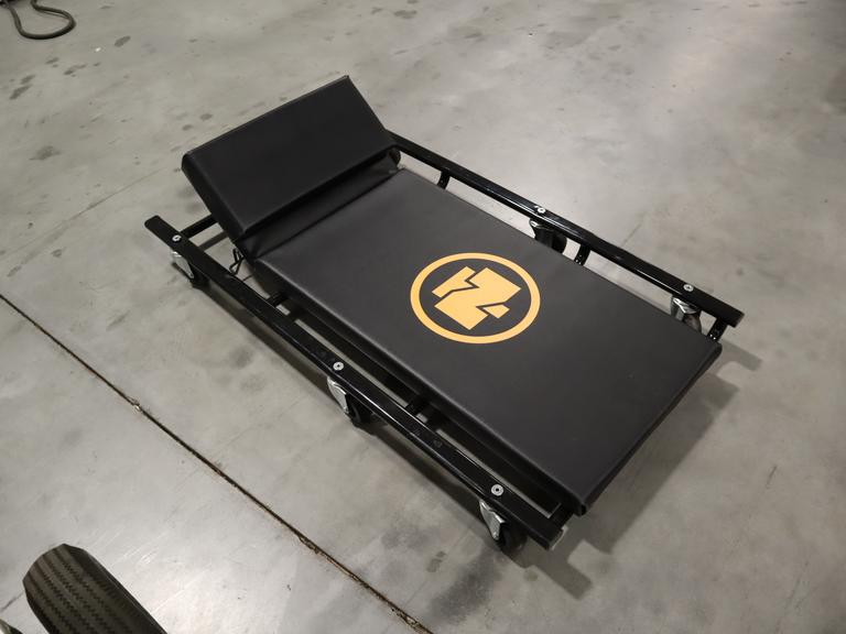 Northern Tool 44" Wide Cushion Creeper with 6 Swivel Wheels and Adjustable Head Rest