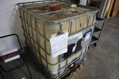 Schutz 300 Gallon Plastic Oil Container with Metal Caging with Small Amount of Fuel Oil